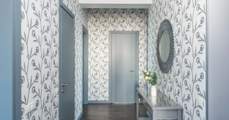 Clean organized home entryway with console table and mirror