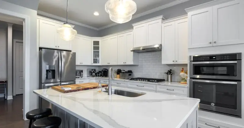 Kitchen stovetop being cleaned with eco-friendly solution