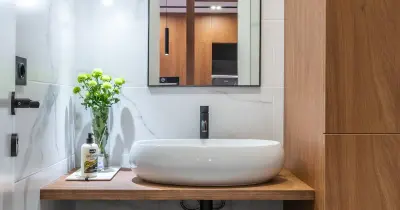 Clean bathroom with natural cleaning products on counter