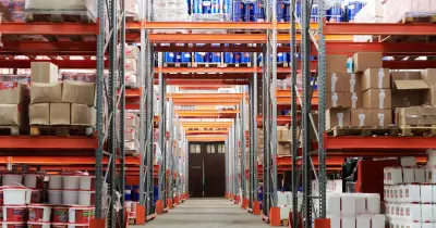 Large warehouse interior with clean concrete floors