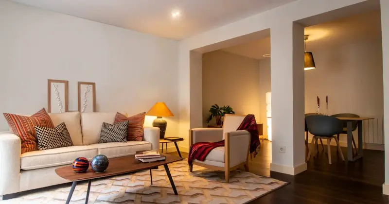 Cozy living room design with warm light and winter decor